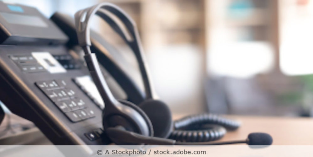 Telefon mit Headset.