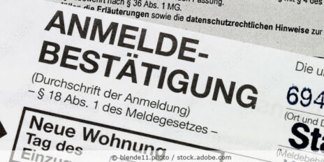 Anmeldebestätigung als Papierformular nach dem Meldegesetz.