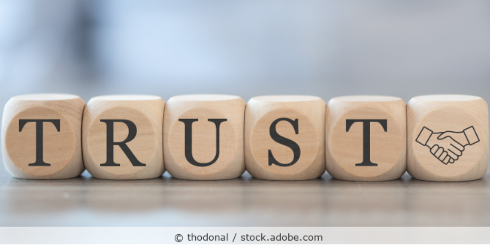 Würfel mit der Aufschrift trust.