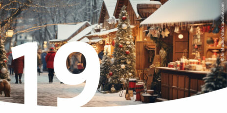 Verschneiter Weihnachtsmarkt und im Vordergrund die Zahl 19.